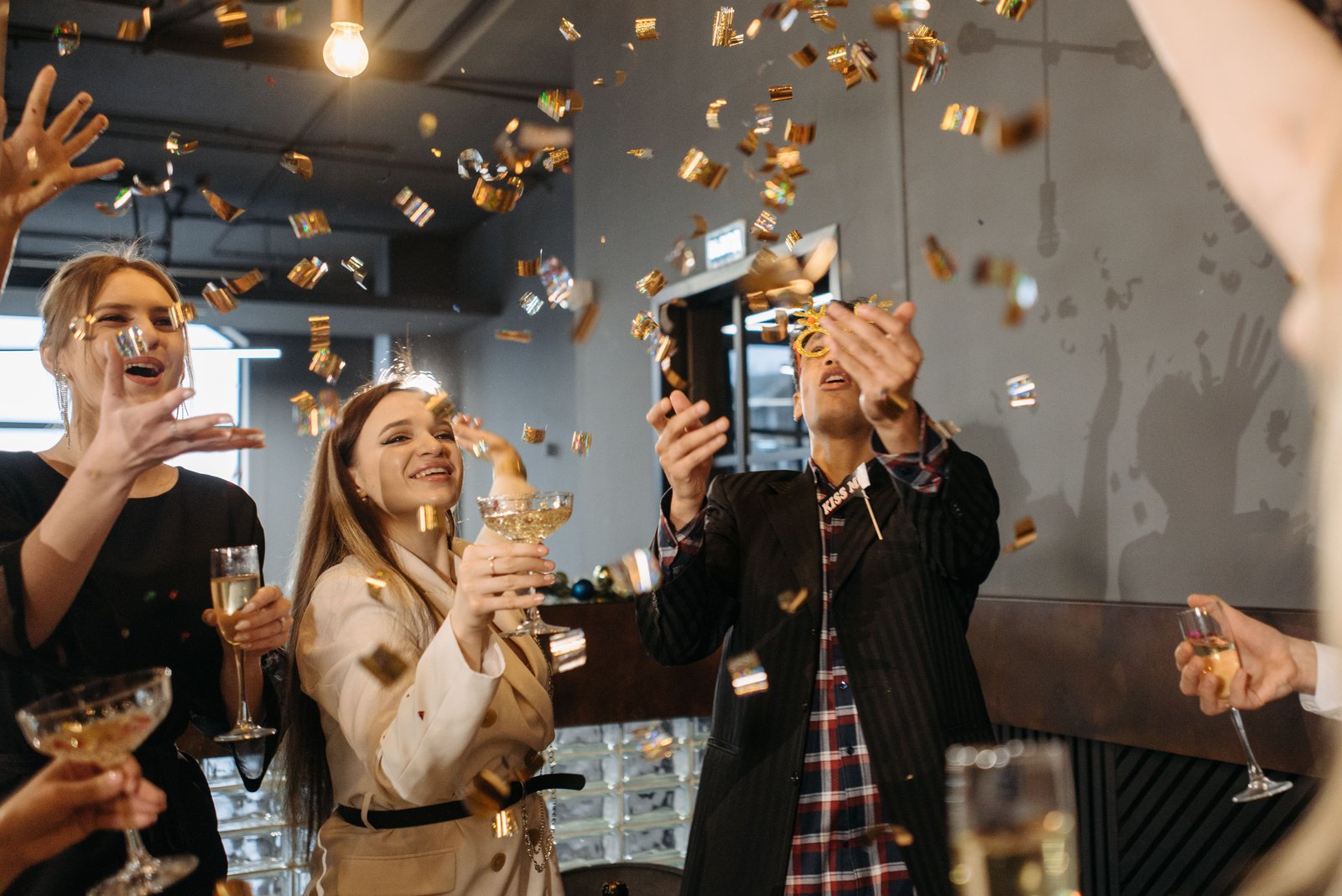 WHG colleagues celebrating with champagne at a corporate event